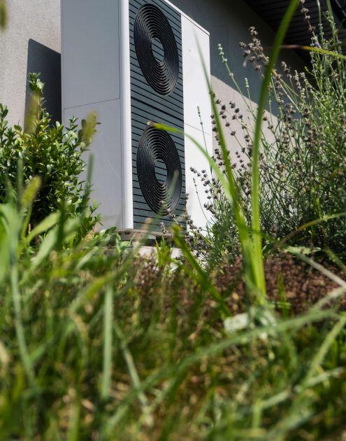 external-heat-pump-unit-against-wall-house-modern-technologies-energy-saving